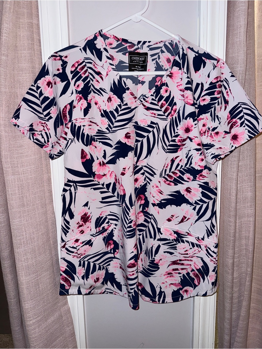 Cherokee Floral Palm Print Short Sleeve Scrub Top in Navy and Pink
